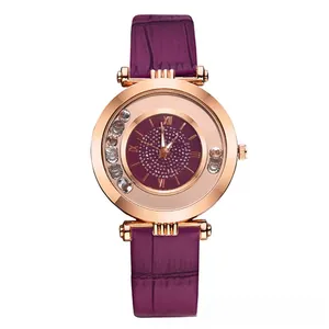Macro view of purple crocodile texture leather strap and rose gold watch casing detail
