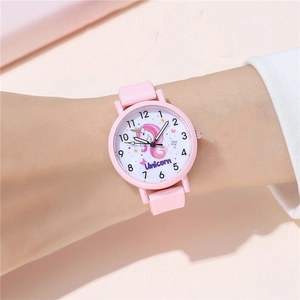 Close-up of a pink unicorn cartoon kids watch with a flexible soft silicone strap