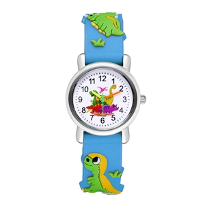 Détail des motifs de dinosaures 3D et aiguilles colorées sur une montre en silicone bleu