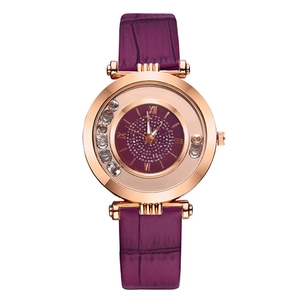 Elegant rose gold women's watch with purple glitter dial and moving rhinestone beads