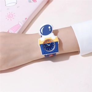 Close-up of children astronaut watch with 3D spaceman figure and blue starry dial