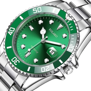 Macro shot of green sunray dial quartz watch with stainless steel strap and date window