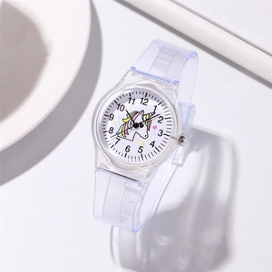 Macro shot of children's quartz watch featuring unicorn dial and clear plastic strap