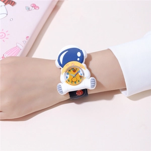 Wrist shot of a 3D astronaut kids watch featuring a blue helmet and yellow dial