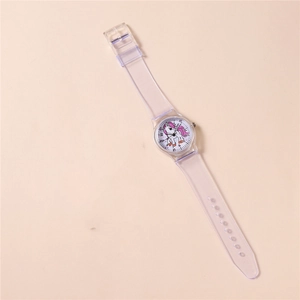 Detail of children's watch featuring a pink unicorn dial and transparent strap