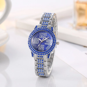 Women's quartz watch with blue rhinestones, silver chain strap and navy glitter dial