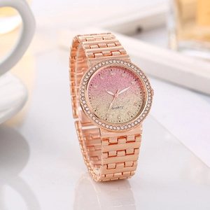 Elegant rose gold women's watch featuring a crystal bezel and pink glitter gradient dial