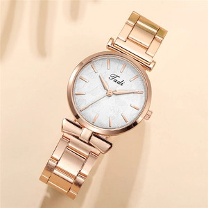 Elegant rose gold women's quartz watch with a white leaf-patterned dial and mesh band