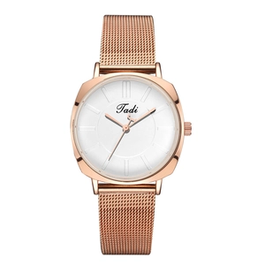 Minimalist rose gold quartz watch with white dial and mesh metal strap for women