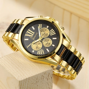 Geneva gold and black stainless steel sports watch with roman numerals on wood background