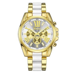 Close-up of Geneva gold and white quartz watch with Roman numerals and triple sub-dials