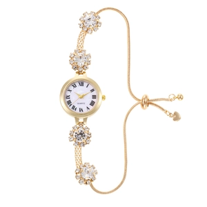 Orologio da donna dorato a bracciale con maglie a fiori di cristallo e numeri romani