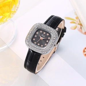 Elegant ladies square silver watch with rhinestone bezel and black faux leather strap