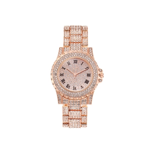 Montre de luxe pour femme en or rose avec cristaux et chiffres romains