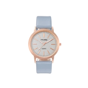 Detail of rose gold alloy quartz watch with blue PU leather strap and silver glitter dial