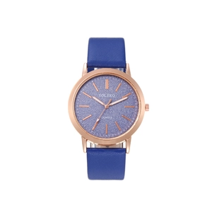 Detail view of the deep blue starry dial and rose gold alloy case of the quartz watch