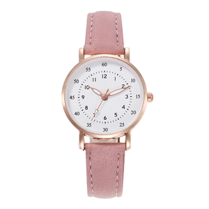 Minimalist women's watch with pink matte strap and rose gold case on white background