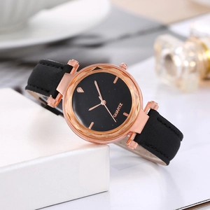 Elegant women's quartz watch with black starry dial and rose gold case on a gift box