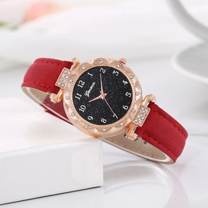 Women's star-patterned quartz watch with red leather strap and sparkling crystal bezel
