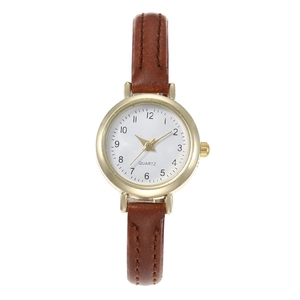 Montre quartz femme minimaliste avec boîtier doré et bracelet en cuir marron cousu