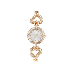 Elegant gold quartz watch for women with heart-shaped crystal-set links and white dial