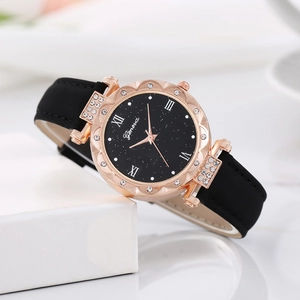 Montre quartz pour femme avec cadran noir étoilé, boîtier rose doré et détails strass