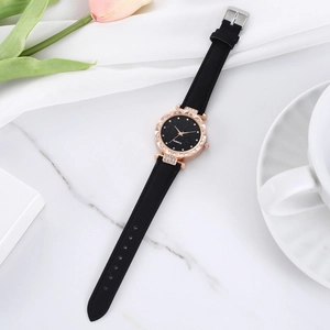 Elegant women's starry sky quartz watch with rose gold case and black leather strap