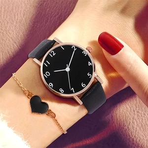 Minimalist women's quartz watch with black leather strap and heart bracelet set