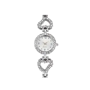 Elegant silver quartz watch with heart-shaped rhinestone bracelet and clear white dial