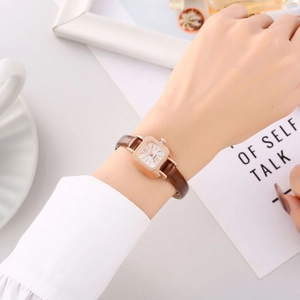 Vintage women's square quartz watch with rose gold case and slim brown leather strap