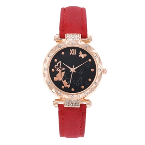 Women's quartz watch with red strap, butterfly dial, and crystal-set rose gold case