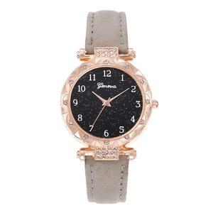 Close-up of Geneva women's watch with starry black dial and grey suede leather strap