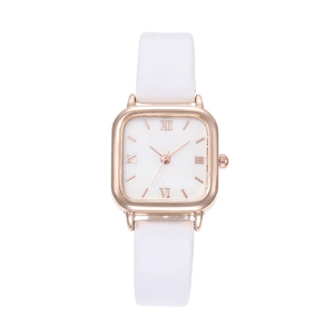 Detailed close-up of a square rose gold quartz watch with a slim white leather strap