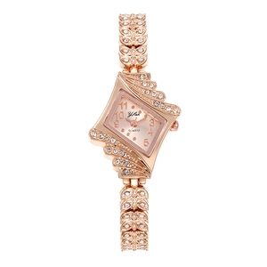 Montre bracelet femme or rose avec strass et cadran irrégulier en forme de losange