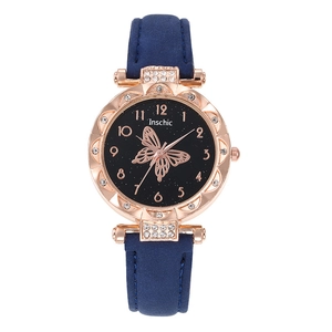Detailed view of women's quartz watch with butterfly dial and rose gold petal case