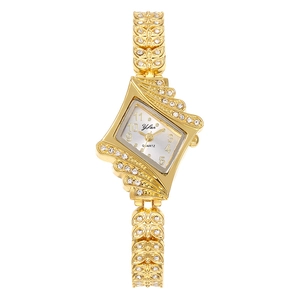 Montre à quartz dorée pour femme avec boîtier en éventail et bracelet à maillons strass