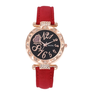 Montre quartz femme avec bracelet daim rouge, boîtier fleuri or rose et cadran étoilé