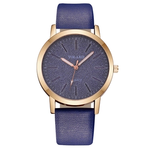 Detailed macro view of the rose gold watch case and blue starry sky textured dial
