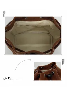 Detail of corduroy bucket bag with drawstring closure and interior canvas pocket