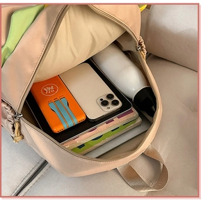 Interior view of cartoon burger backpack showing large storage capacity for tablets and books