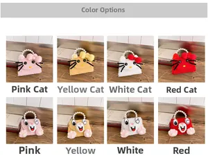 Detail of plush cat and rabbit mini bags with pearl handles and metal chain straps