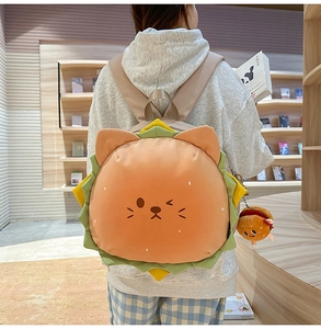 Detailed view of cute cat lion burger backpack with plush charm and wavy lettuce edge