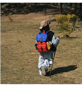 Kids outdoor hiking backpack with vibrant color-block design and multi-pocket details