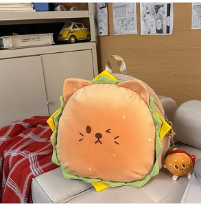 Detail of cute burger cat plush backpack showing soft fabric and mini burger charm