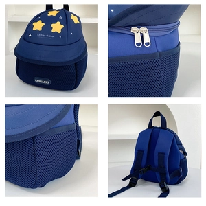 Detail view of navy kids backpack featuring breathable side mesh pockets and secure chest buckles