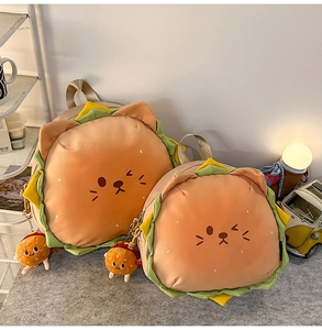 Detail of plush hamburger cat backpack showing soft fabric and cute character features