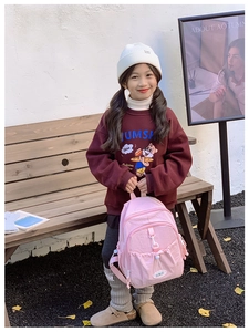 Pink lightweight kids backpack with drawstring pocket and buckle for school outdoor use