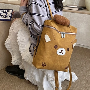 Cute bear-themed mustard yellow canvas school bag with plush pendant for kids