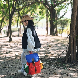 Outdoor kids hiking backpack with vibrant multi-color patchwork and high capacity design
