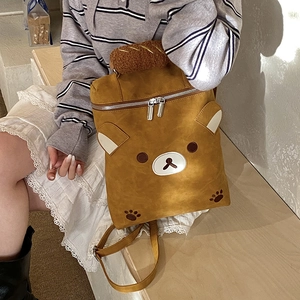 Cute cartoon bear backpack for kids featuring plush 3D ears and brown matte finish